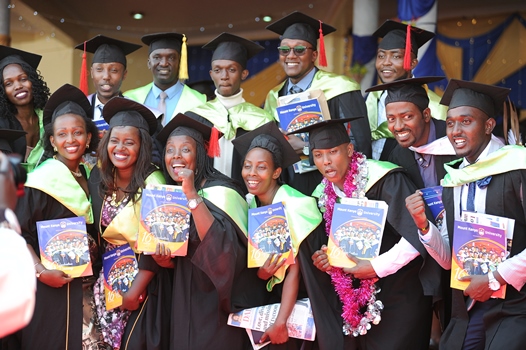 Graduates take a group photo to commemorate their achievement 